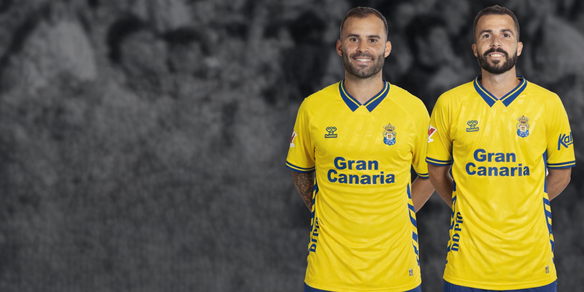 Firma con los jugadores de la UD Las Palmas Jesé y Kirian